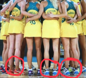 Netballers with taped ankles